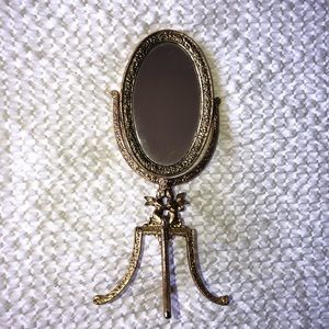 Vintage,Gold Angel  vanity mirror height 8 3/4 inches with 3  3/4 inches